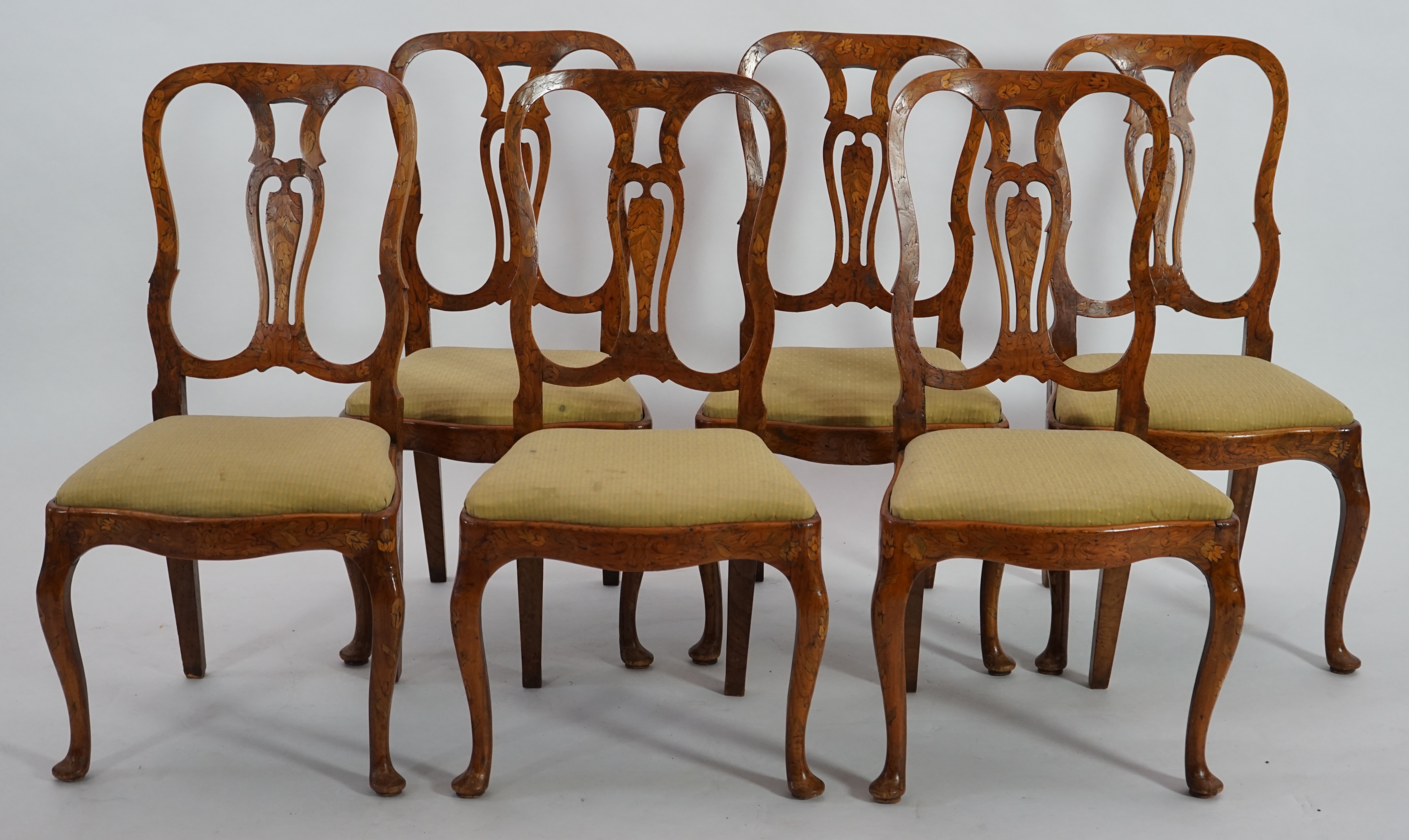 A set of six 18th century Dutch walnut and marquetry dining chairs